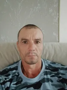 Николай
