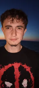 Николай