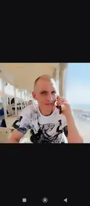 николай