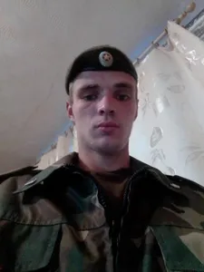 Николай